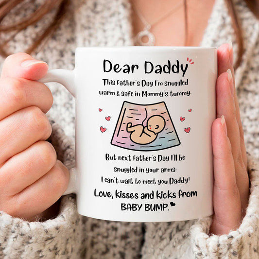 Dad To Be Next Father's Day I'll Be Snuggled In Your Arms Mug
